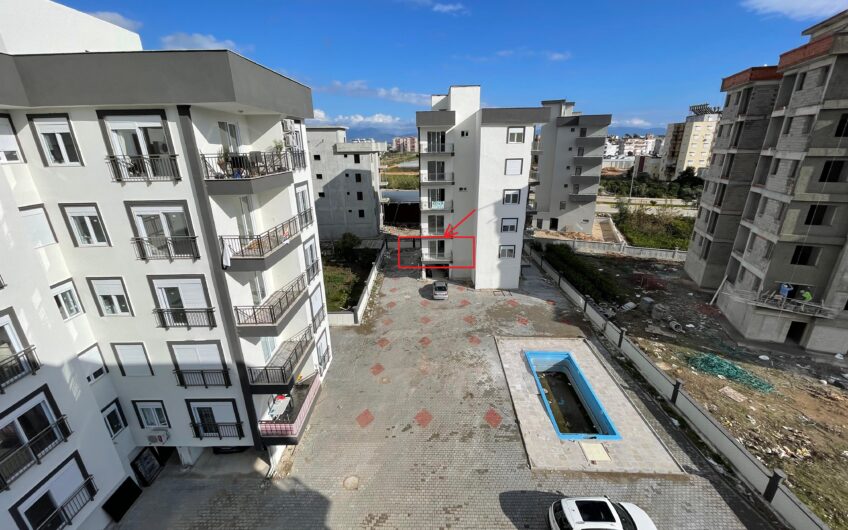New one-bedroom apartment in a complex with a swimming pool in the city of Finike