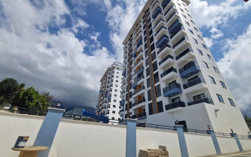 Двухкомнатная квартира с видом на море в комплексе Exodus Hill в районе Махмутлар