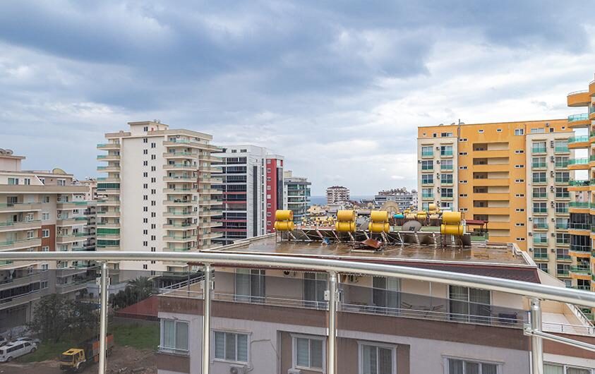 Пятикомнатная квартира-дуплекс в комплексе с бассейном в районе Махмутлар